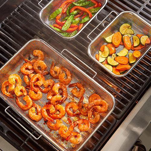 Shrimp and veggies in Modular Grill Pans for Outdoor and Indoor Grilling - top view.