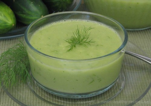 Dill cucumber soup garnished with dill weed.
