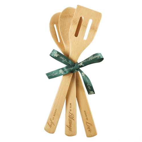 Three-piece, wooden bamboo utensil set tied with green ribbon for gifting with inscribed words of "Blessings, Joy, and Love" imprinted.