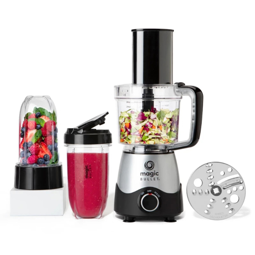 Magic Bullet blender and food processor with 16 oz. cups filled with smoothie and fruit.