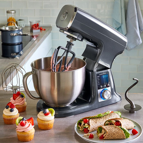 Deluxe Electric Stand Mixer with food on counter.