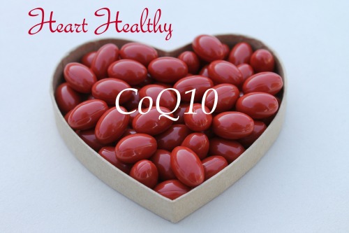 Individual heart healthy CoQ10 supplements arranged in a heart-shaped container.