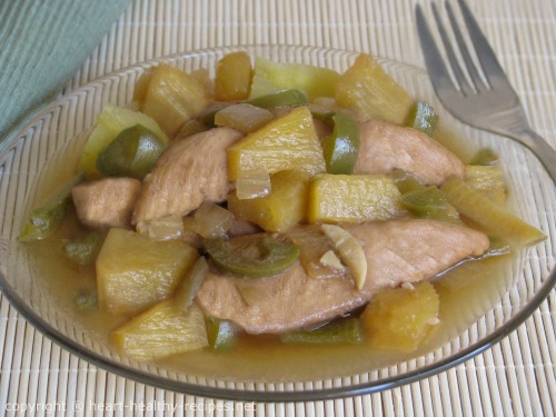 Low-salt chicken pineapple topped with cooked green peppers and onions.
