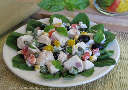 Mediterranean chicken salad with bell peppers, olives, onions and more.
