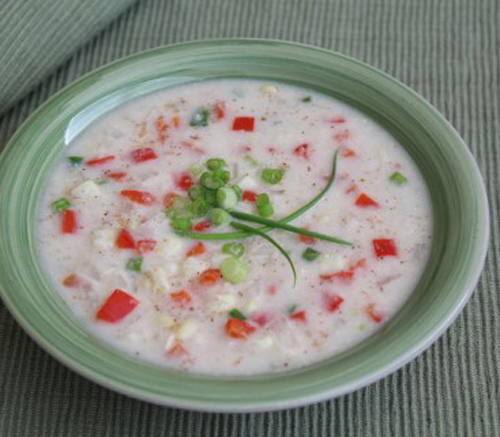 Creamy corn chowder with fancy green onion garnish. Creamy corn chowder with fancy green onion garnish.