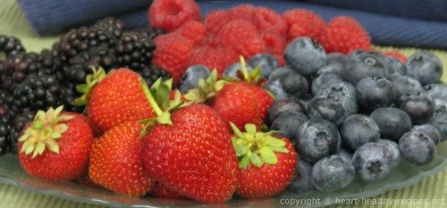 Display of heart healthy blackberries, blueberries, raspberries and strawberries.