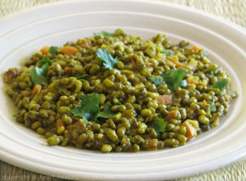 Spicy mung beans garnished with parsley.